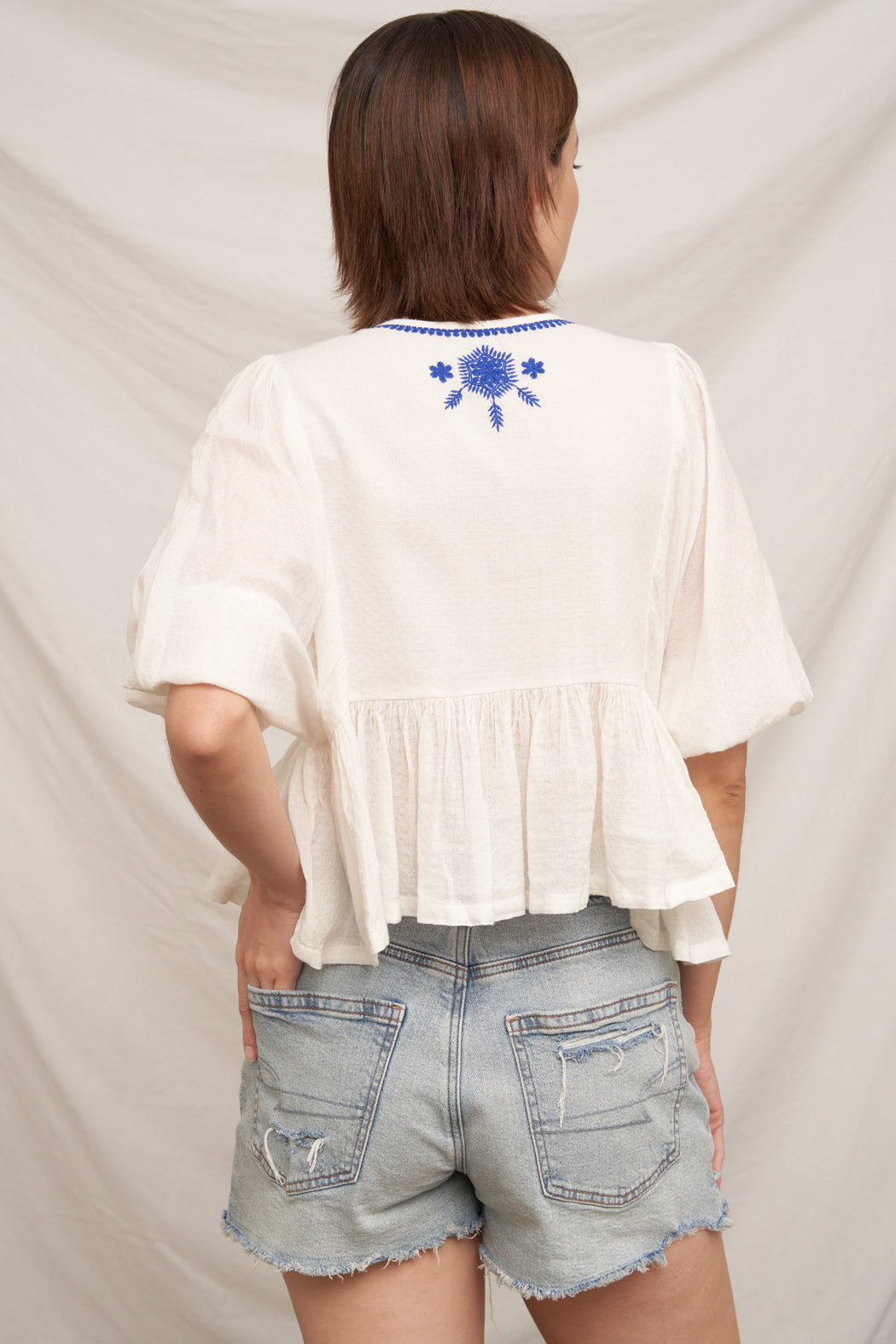 Karmen Embroidered Peplum Top