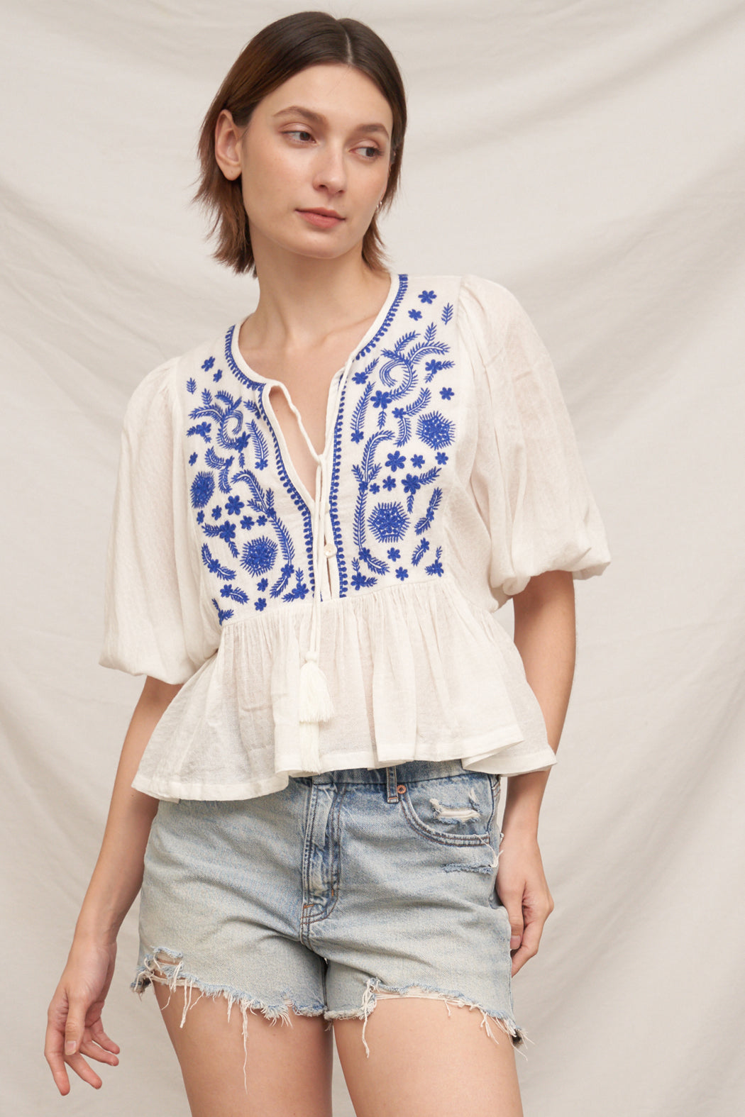 Karmen Embroidered Peplum Top